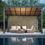 10' x 14' lean-to gazebo with rust-resistant aluminum frame and wood-grain finish in backyard.