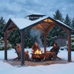 Outdoor 12.5 ft x 12.5 ft gazebo with natural wood-look posts and ceiling hook.